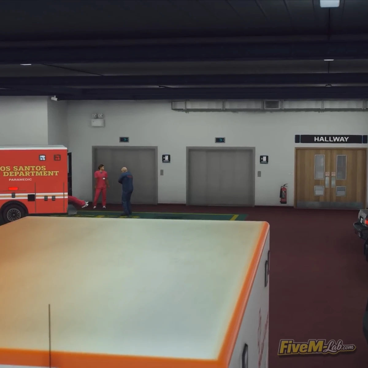 Interior view of the emergency ambulance bay in Pillbox Hospital MLO with hallway and elevator access
