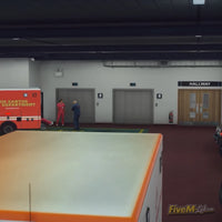 Interior view of the emergency ambulance bay in Pillbox Hospital MLO with hallway and elevator access